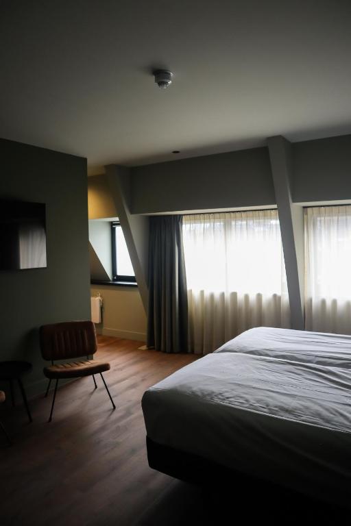 Postel nebo postele na pokoji v ubytování Hotel Central
