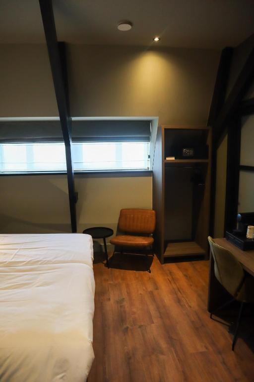 Postel nebo postele na pokoji v ubytování Hotel Central