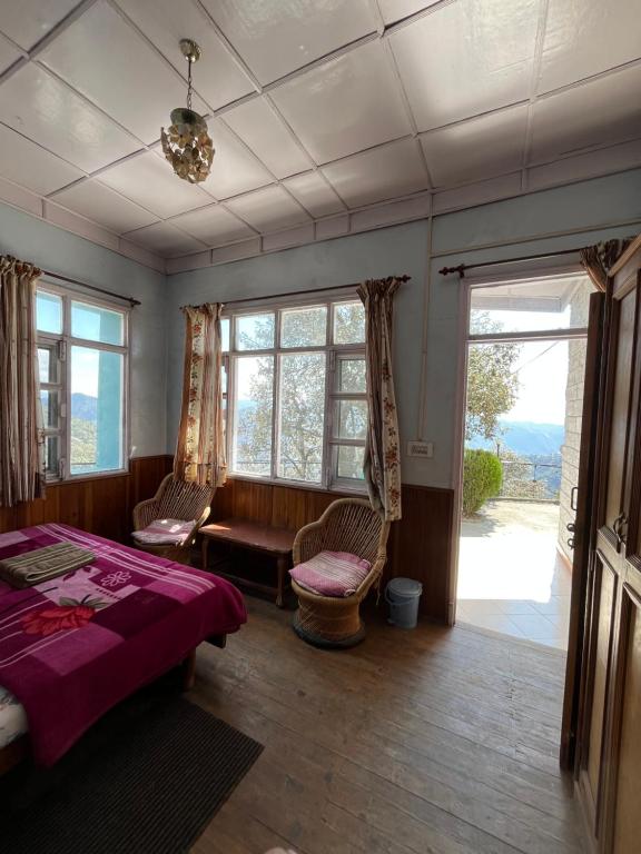 Postel nebo postele na pokoji v ubytování Deelux cottages inn