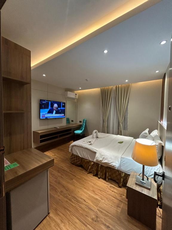 Postel nebo postele na pokoji v ubytování DM Residente Hotel Inns & Villas