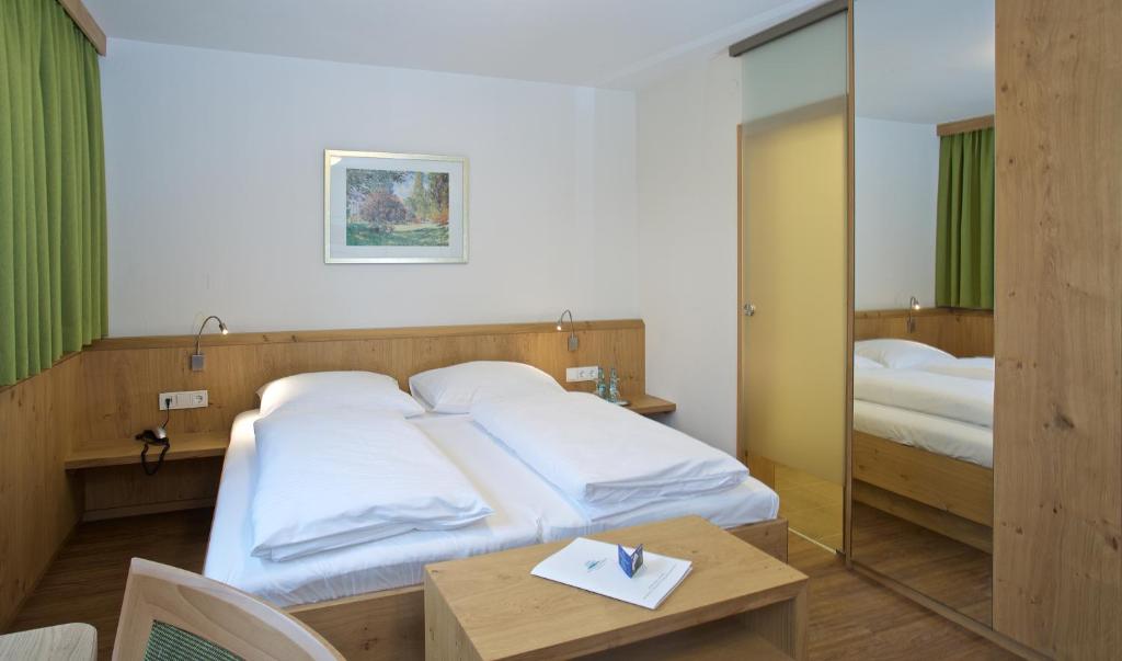 Postel nebo postele na pokoji v ubytování Hotel zur Mühle