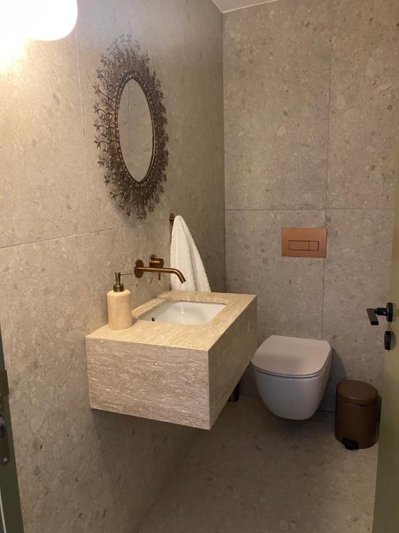 Koupelna v ubytování Spiti Urania