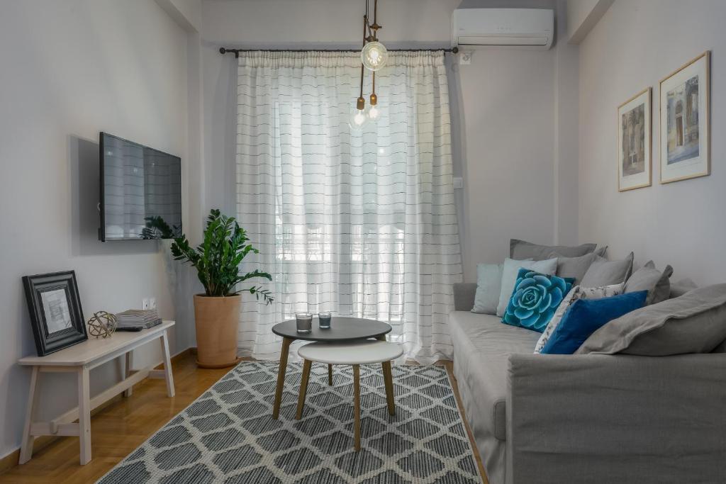 A television and/or entertainment centre at Absolute Athens Apartments