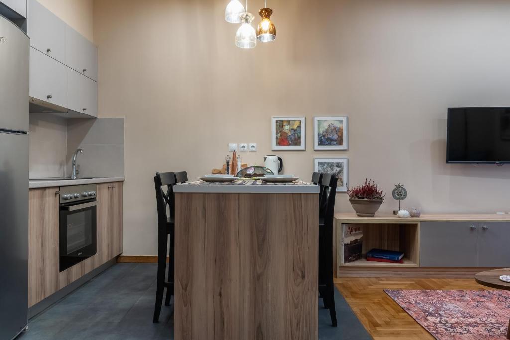 A kitchen or kitchenette at Absolute Athens Apartments