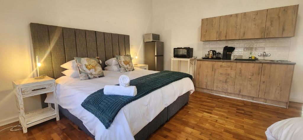 Postel nebo postele na pokoji v ubytování Carrington Guesthouse