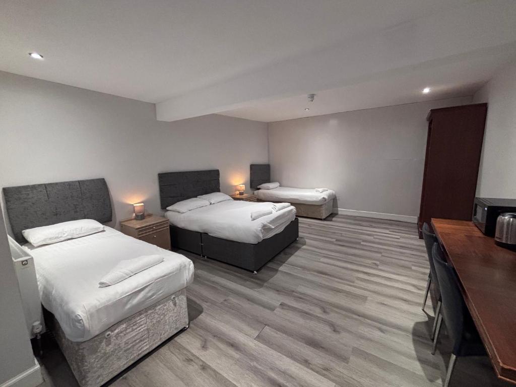 Postel nebo postele na pokoji v ubytování Park View Rooms