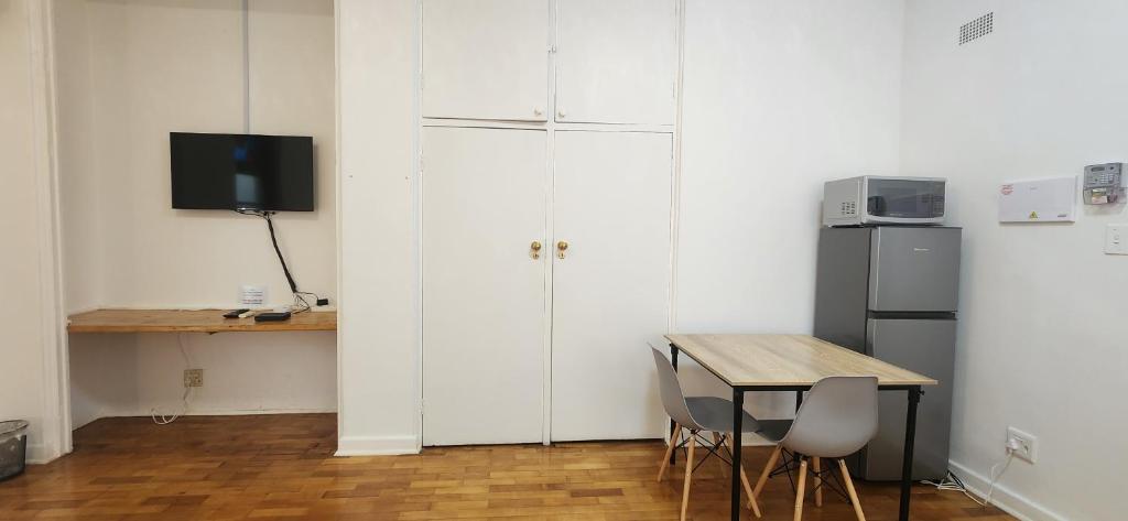 Kuchyň nebo kuchyňský kout v ubytování Carrington Guesthouse