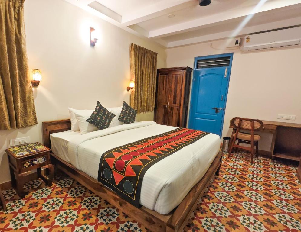 Postel nebo postele na pokoji v ubytování Ibex Resorts, Coimbatore Kakarla