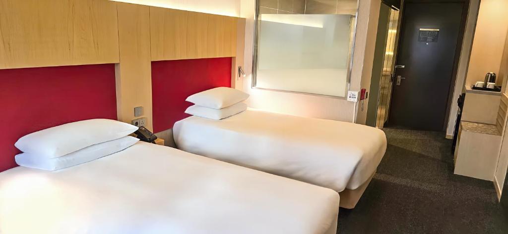 Krevet ili kreveti u jedinici u okviru objekta Hotel Midcity Myeongdong