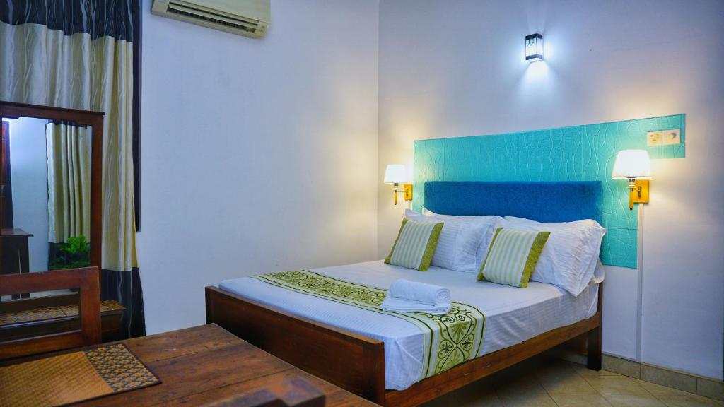 Katil atau katil-katil dalam bilik di Hotel Planet Residency