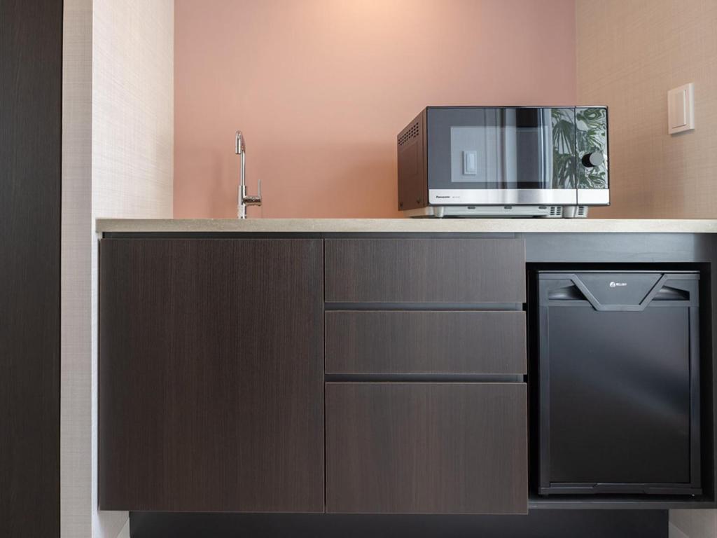 Kuchyň nebo kuchyňský kout v ubytování Loisir Hotel Kyoto Toji