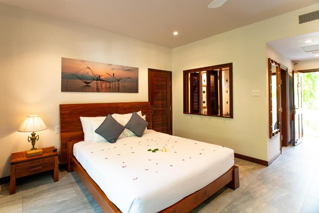 Phòng Deluxe Giường Đôi/2 Giường Đơn Với Ban Công Và Tầm Nhìn Ra Vườn