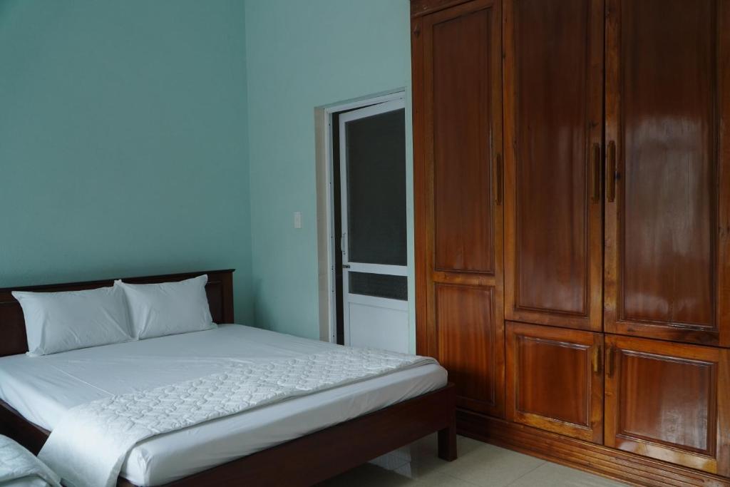Postel nebo postele na pokoji v ubytování Local Ha Giang Tours & Hotel