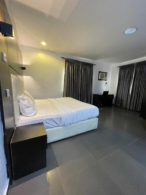 Postel nebo postele na pokoji v ubytování Apartment 1A