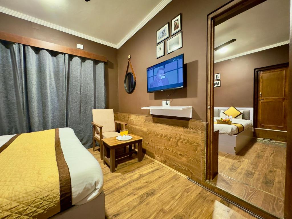 TV a/nebo společenská místnost v ubytování Hotel Jafson Accommodates