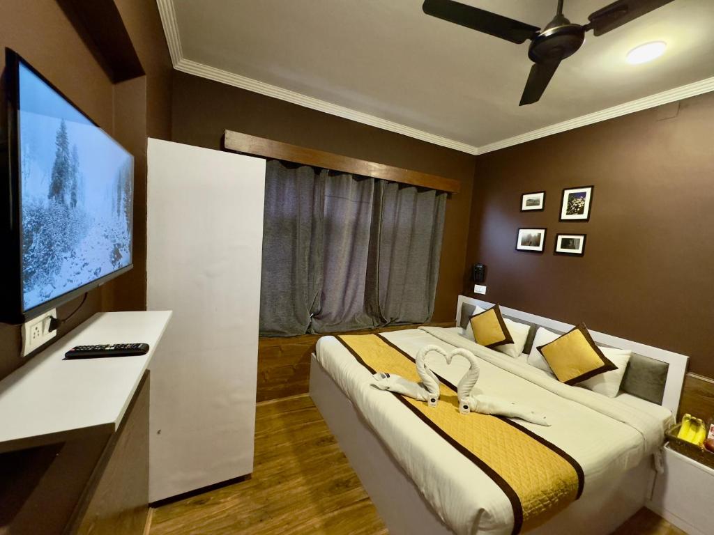 TV a/nebo společenská místnost v ubytování Hotel Jafson Accommodates