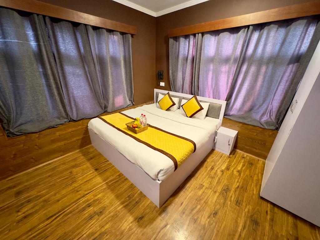 Postel nebo postele na pokoji v ubytování Hotel Jafson Accommodates