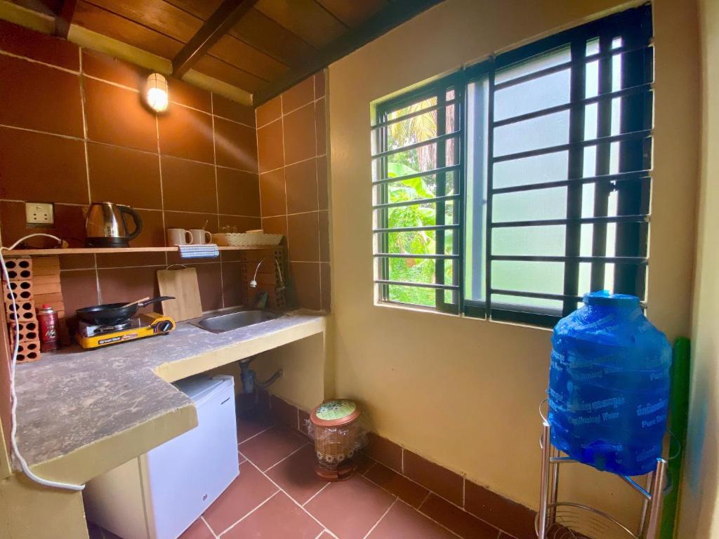 Kuchyň nebo kuchyňský kout v ubytování Derm Svay Guesthouse - yoga & cafe