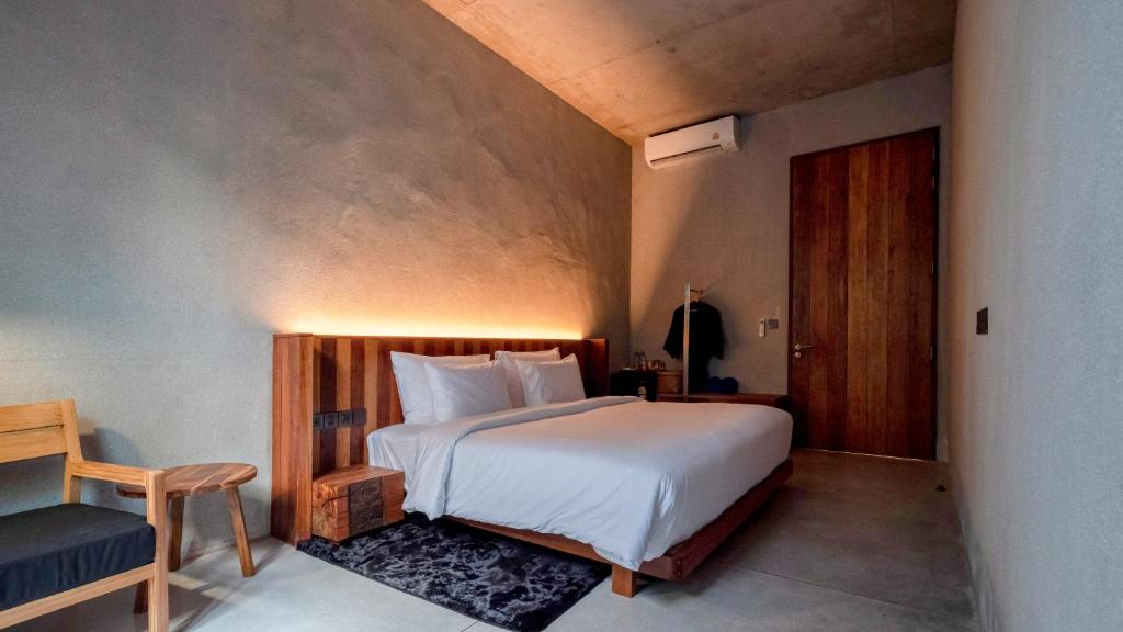 Postel nebo postele na pokoji v ubytování Vows Villa Beachfront