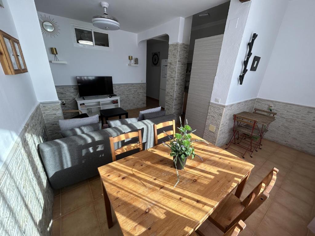 Televízia a/alebo spoločenská miestnosť v ubytovaní Apartamento frente al Mar Pedregalejo