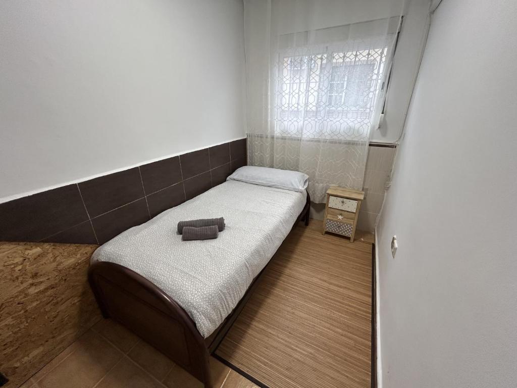 Posteľ alebo postele v izbe v ubytovaní Apartamento frente al Mar Pedregalejo