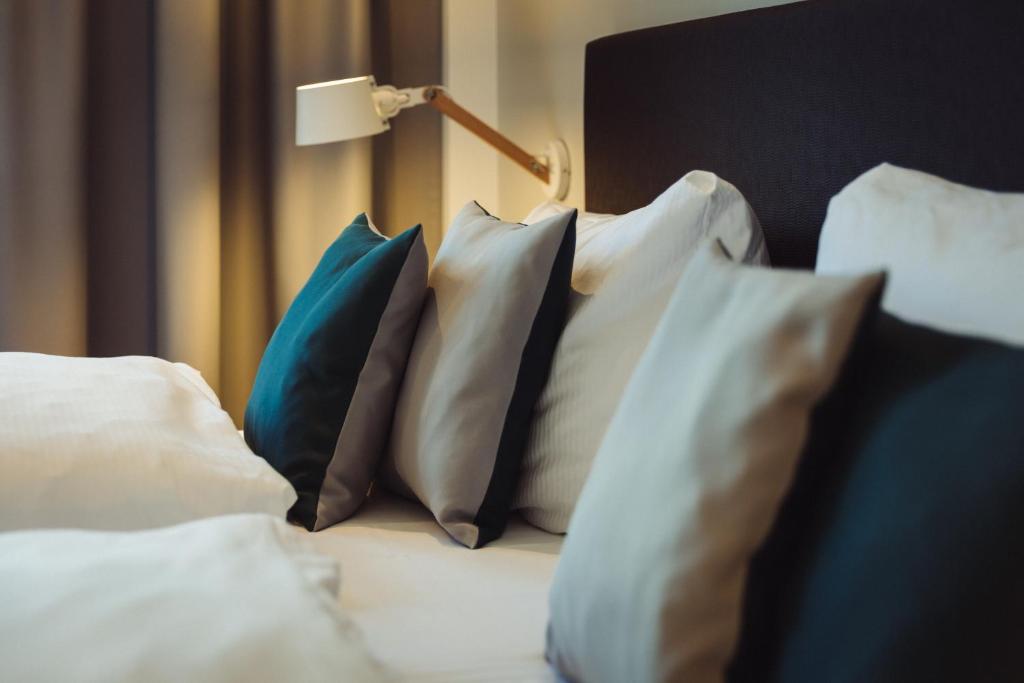 Postel nebo postele na pokoji v ubytování Hotel Zum Schwan Wanfried