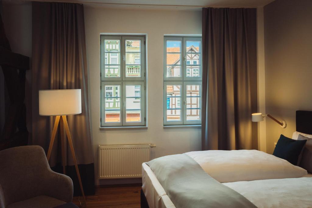 Postel nebo postele na pokoji v ubytování Hotel Zum Schwan Wanfried