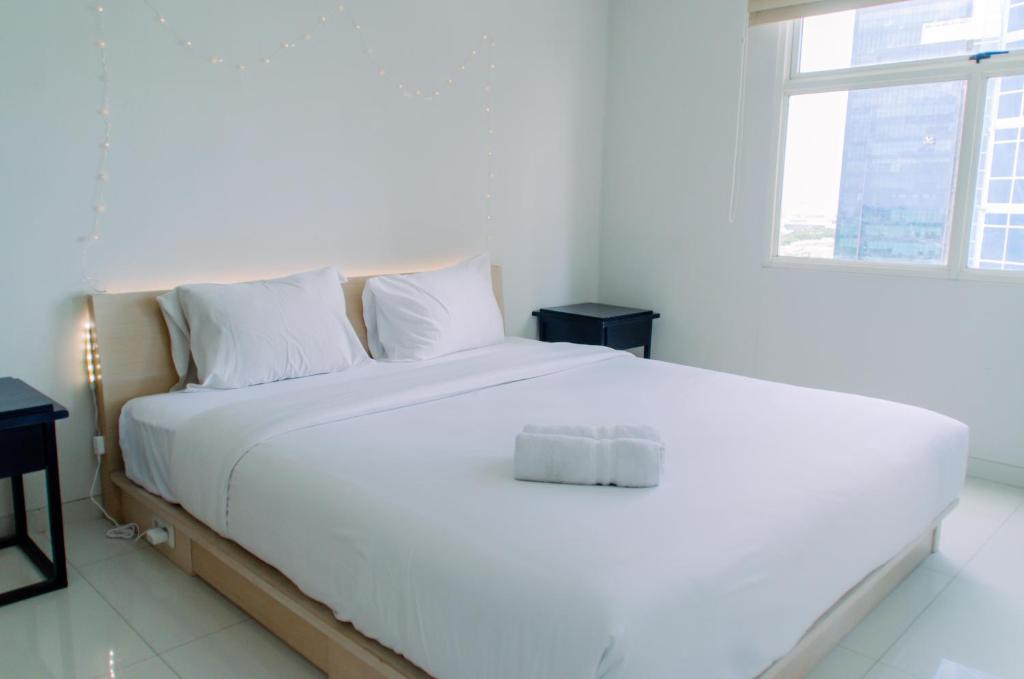 Fotografie z fotogalerie ubytování Fancy and Nice 1BR Apartment at Silkwood Residence By Travelio v destinaci Tangerang