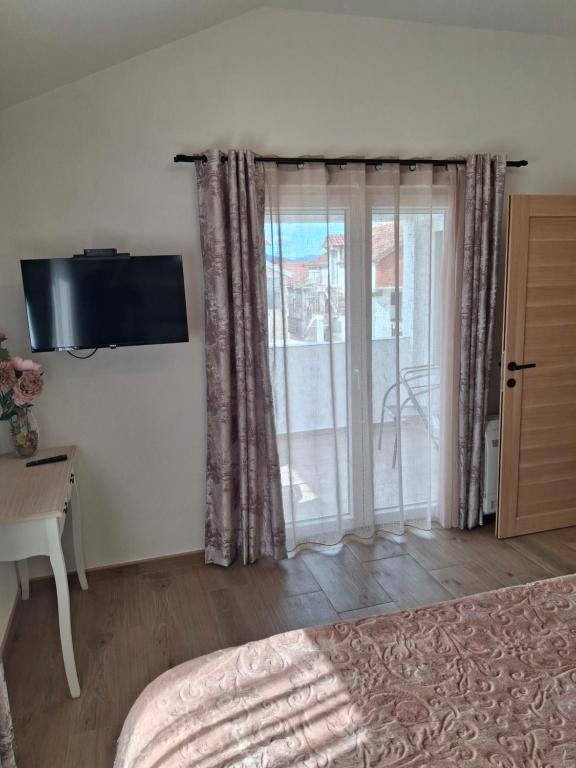 TV a/nebo společenská místnost v ubytování House 23 B1