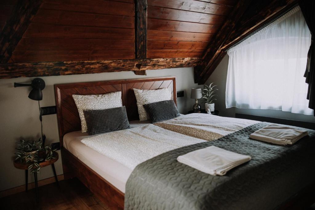 Postel nebo postele na pokoji v ubytování Mushrooms Malomszállás