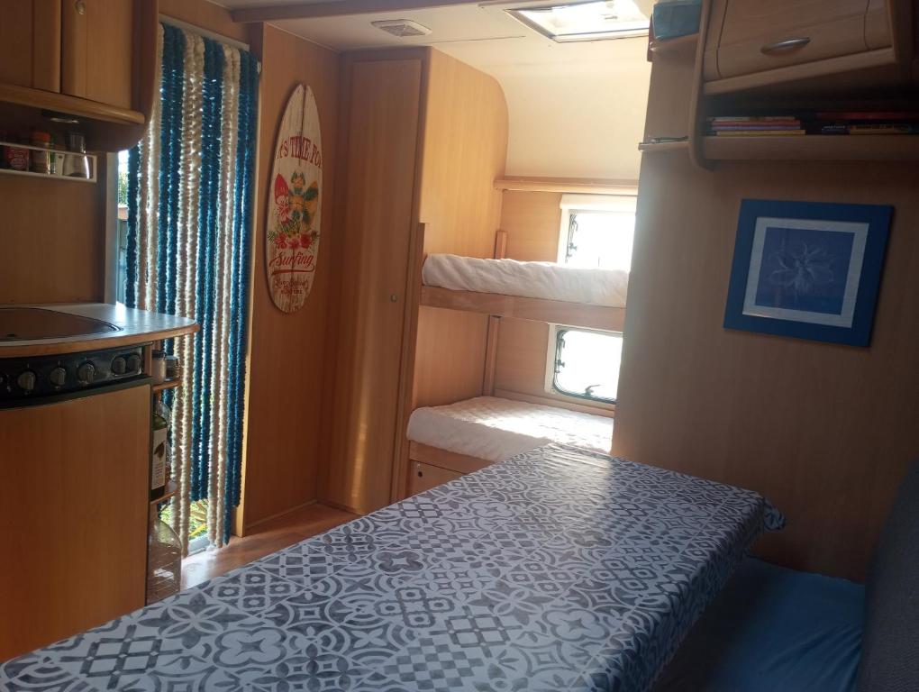 Postel nebo postele na pokoji v ubytování KairamSurf