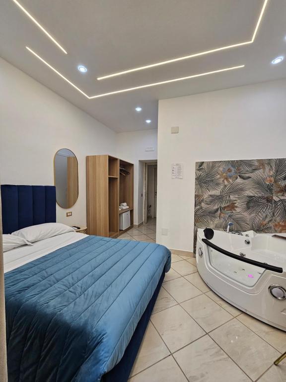 Posteľ alebo postele v izbe v ubytovaní B&B Napoli Centrale Room&Jacuzzi