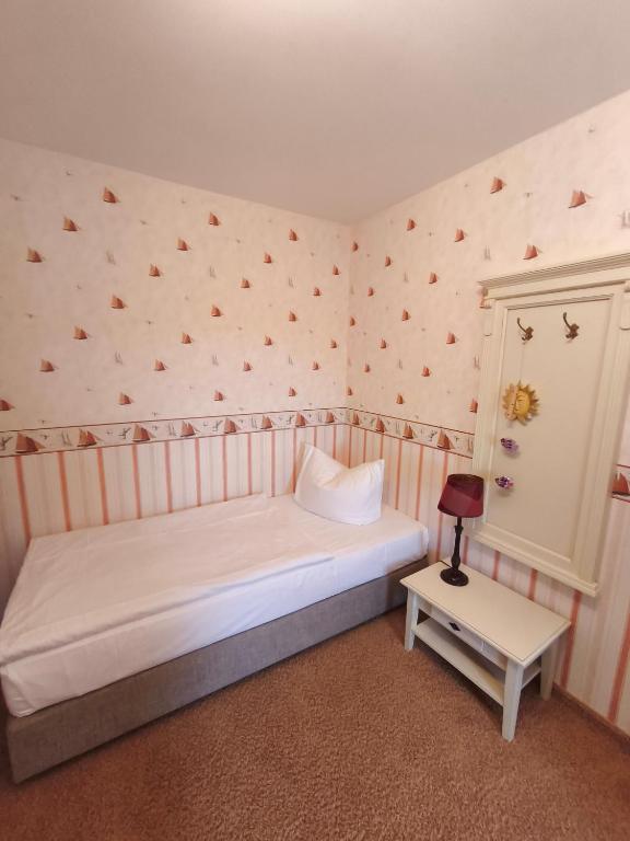 Postel nebo postele na pokoji v ubytování Hotel Nautilus