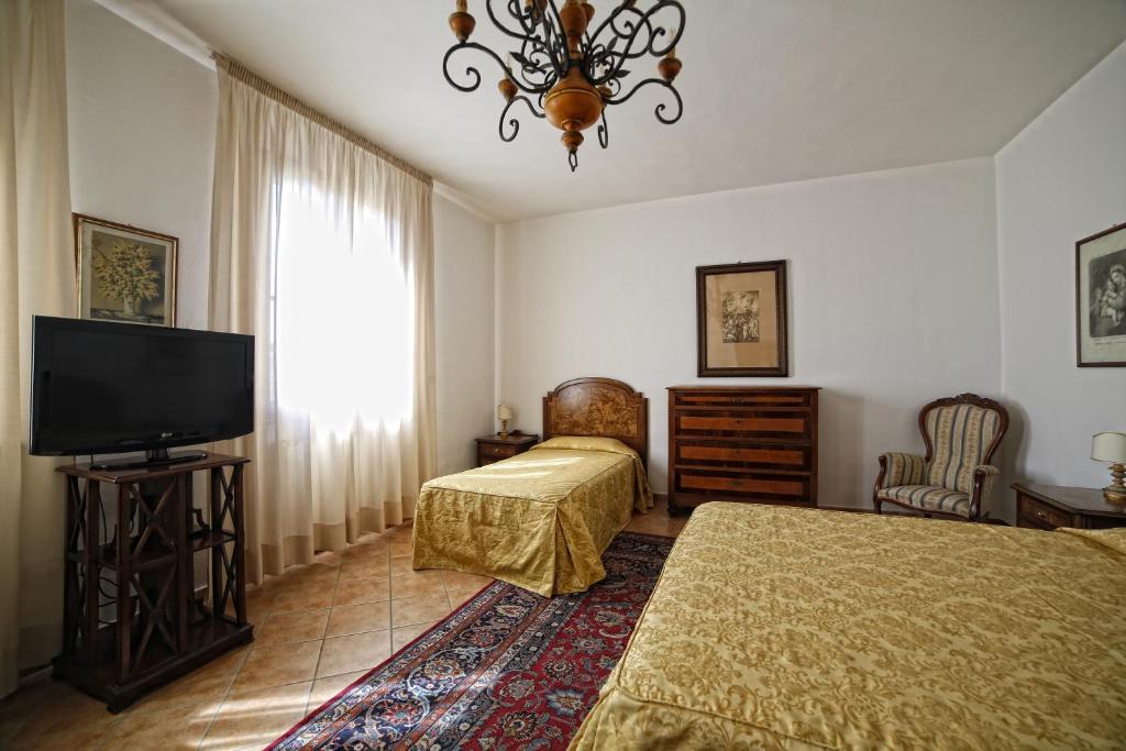 Łóżko lub łóżka w pokoju w obiekcie Hotel Luna