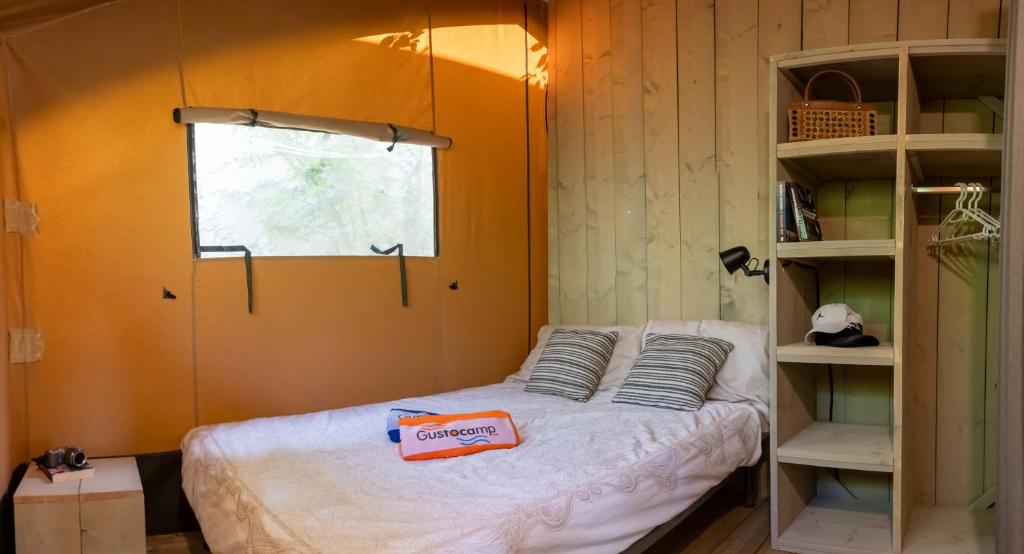A bed or beds in a room at Casa Mobile - Cisano San Vito ****