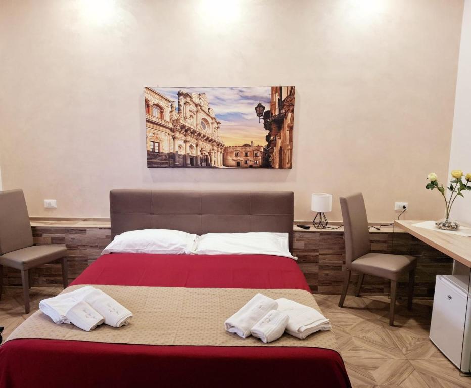 Postel nebo postele na pokoji v ubytování LECCE MON AMOUR B&B