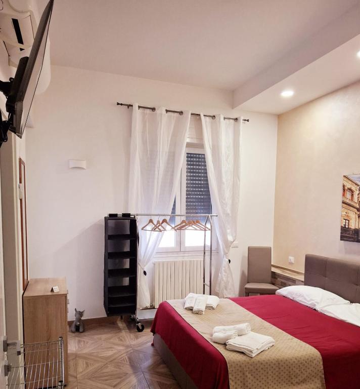 Postel nebo postele na pokoji v ubytování LECCE MON AMOUR B&B