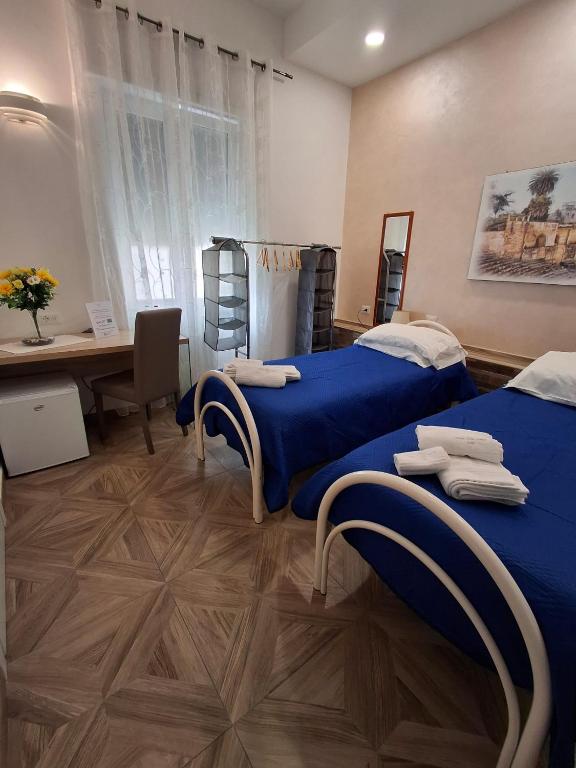 Postel nebo postele na pokoji v ubytování LECCE MON AMOUR B&B