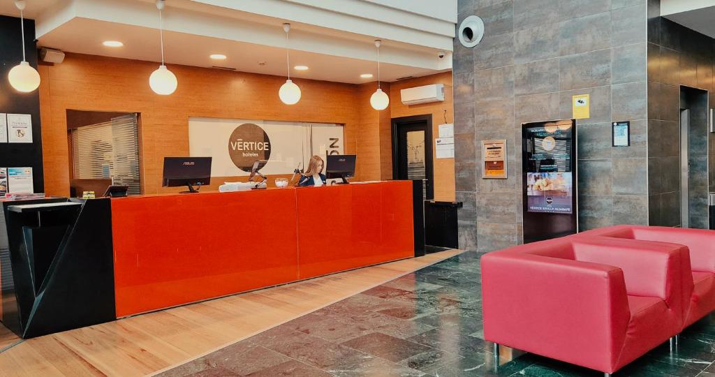 El vestíbulo o zona de recepción de Vértice Sevilla Aljarafe