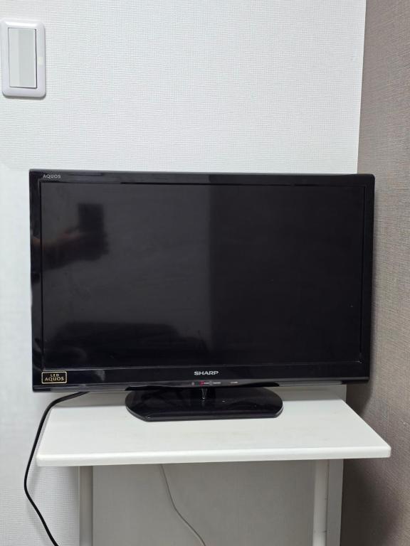 TV a/nebo společenská místnost v ubytování NINN102 - Osaka Itami Airport Guest House 大阪国際空港 伊丹空港 ITM ゲストハウス ニン
