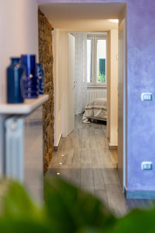 Łóżko lub łóżka w pokoju w obiekcie La Corte - Seta apartment Bellagio