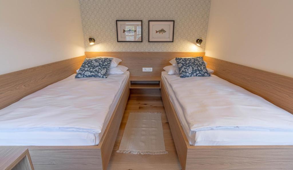 Postel nebo postele na pokoji v ubytování Lake Bled Apartments