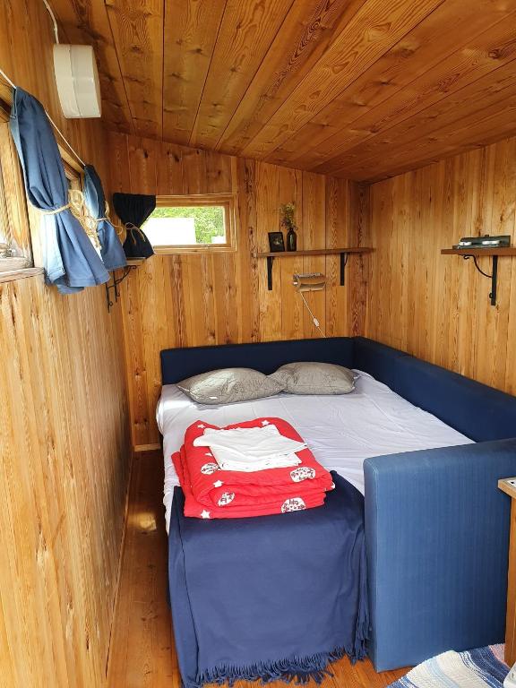 Postel nebo postele na pokoji v ubytování Siaröfortet
