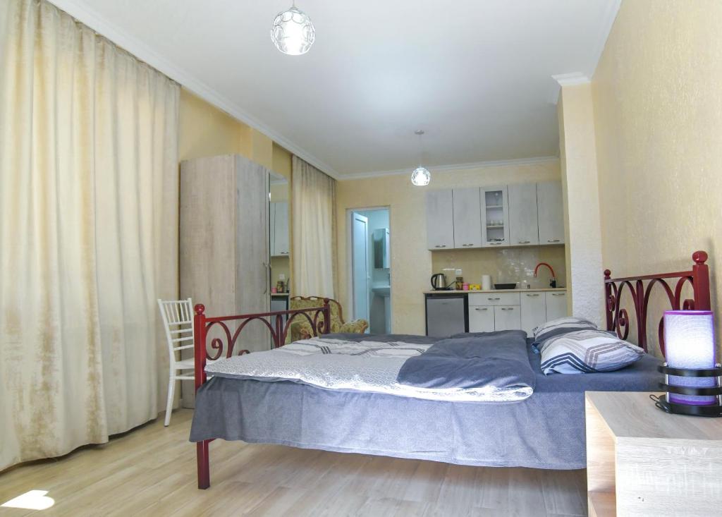 Kuchyň nebo kuchyňský kout v ubytování Hotel MASPINDZELO