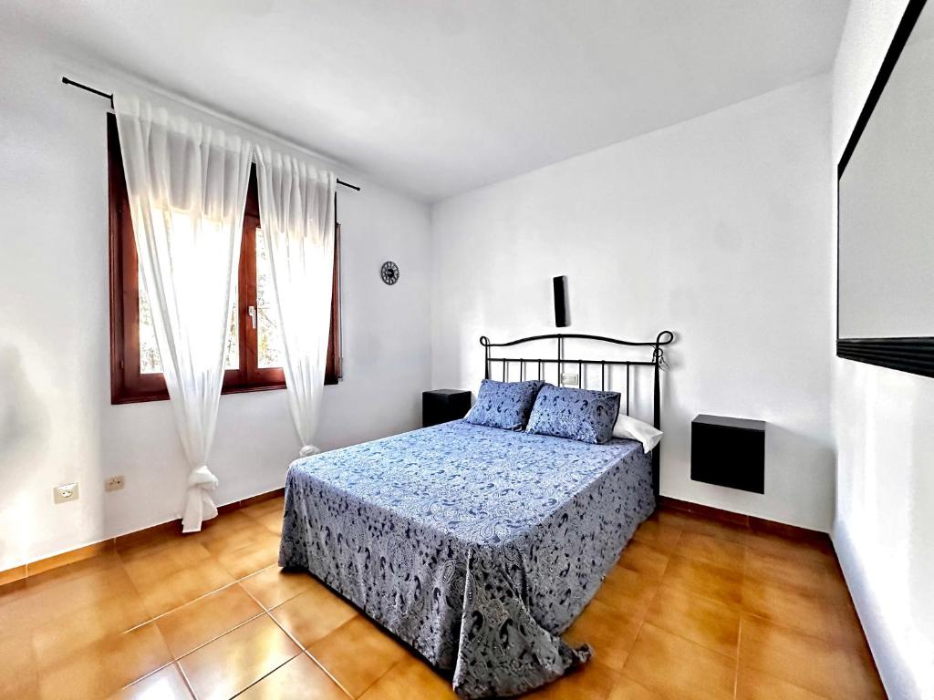 Posteľ alebo postele v izbe v ubytovaní Melis Mar - Apartamento con vistas en Pals
