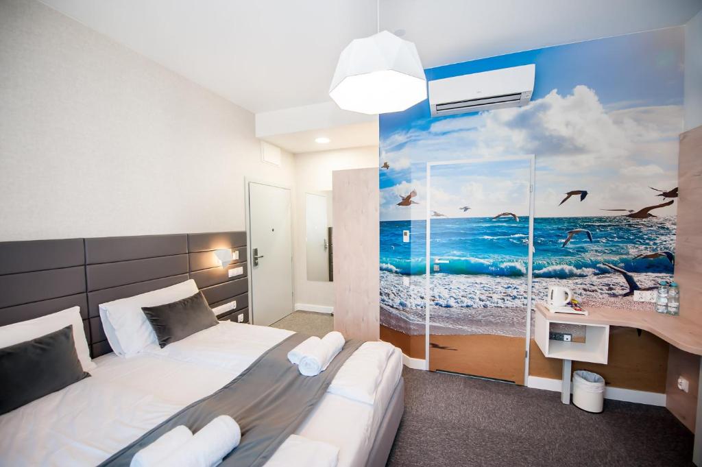 Postel nebo postele na pokoji v ubytování Hotel Gdynia Boutique