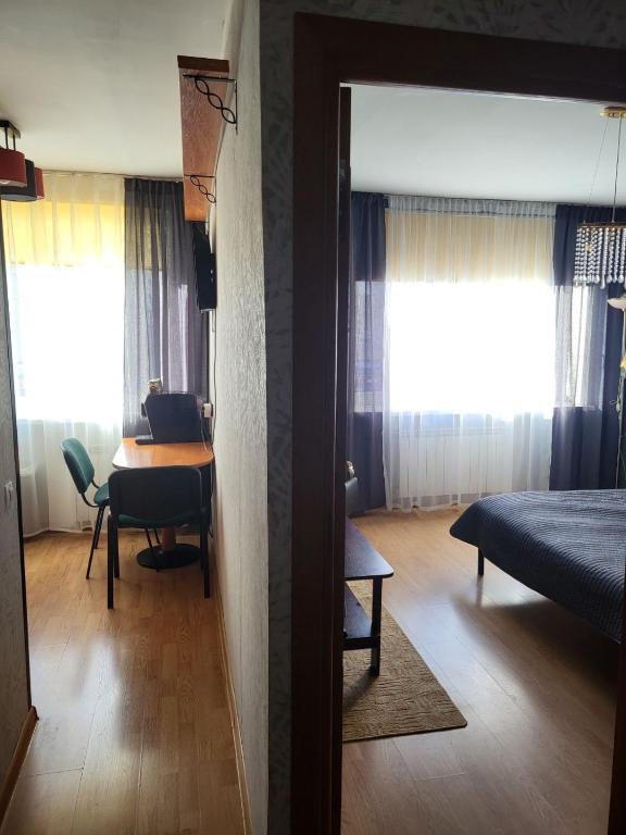 Postel nebo postele na pokoji v ubytování Narva Apartments