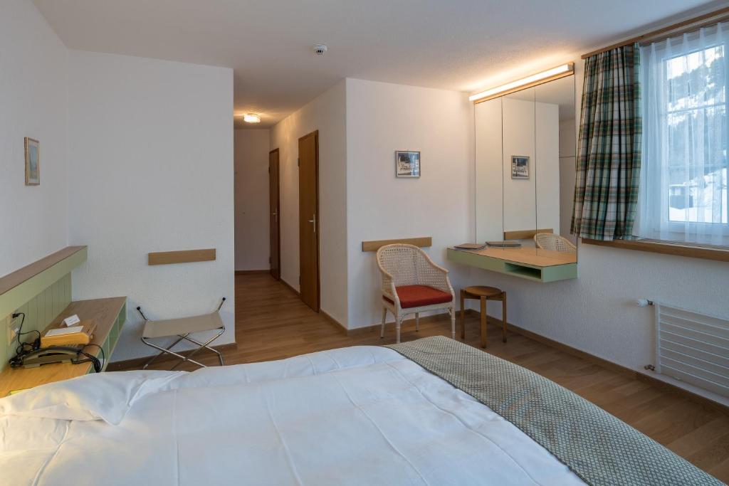 Letto o letti in una camera di Hotel Post
