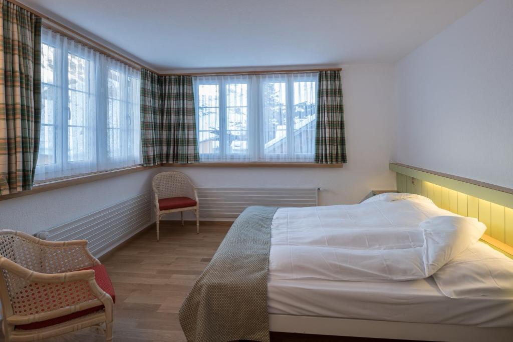 Letto o letti in una camera di Hotel Post