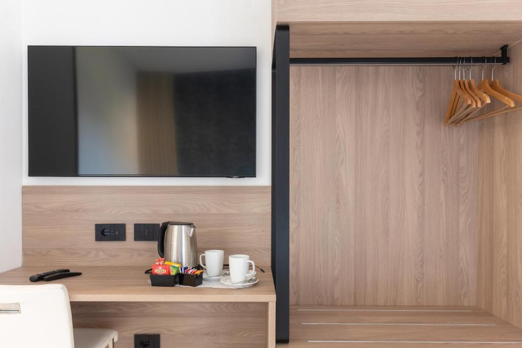 Příslušenství pro přípravu čaje a kávy v ubytování Hotel Maiuri Pompei